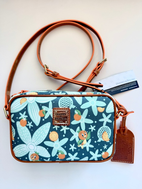 Dooney & Bourke Handbags - 🧡Dooney & Bourke Disney Epcot Flower Garden 2024 Orange Bird Crossbody Purse Bag